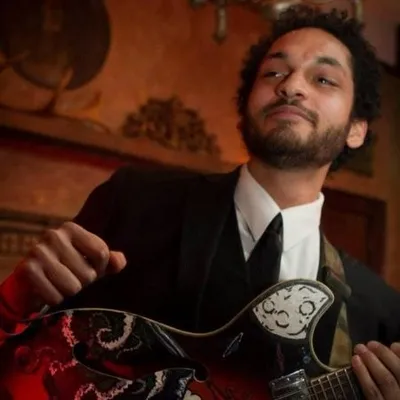 Dennis performing music